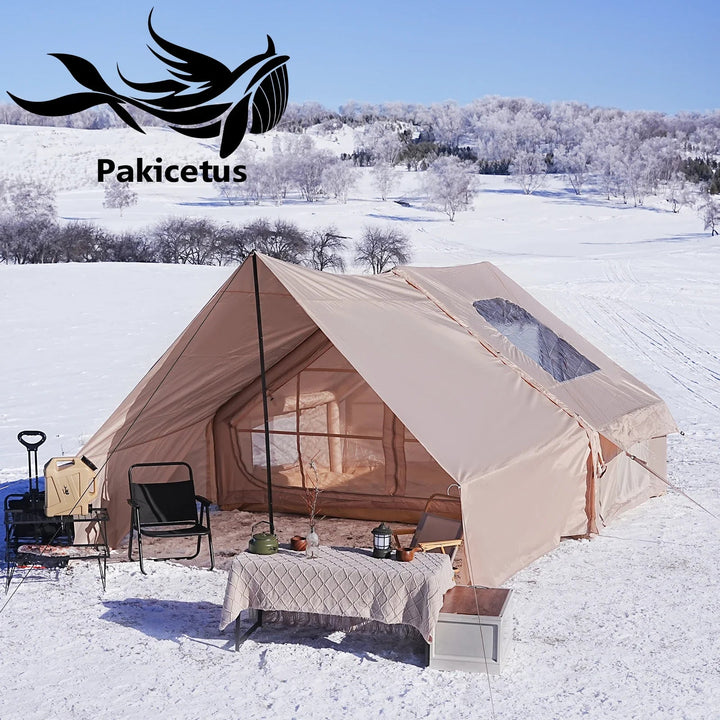 Sea Dragon Dreams PAKICETUS inflatable beige polyester camping tent set up in a snowy outdoor landscape