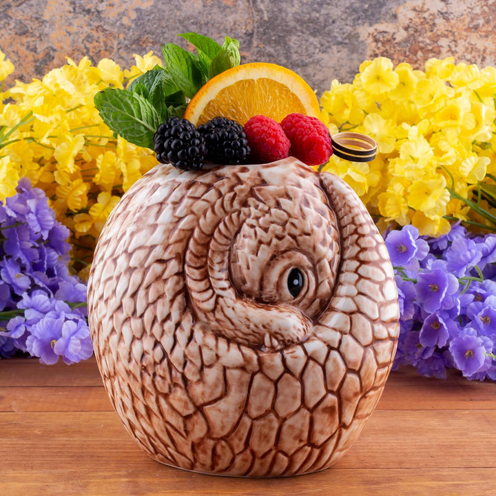 Sea Dragon Dreams BarConic Pangolin Tiki Mug, a 25 oz ceramic cocktail mug with detailed scale texture and fruit garnish