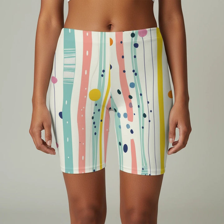Sea Dragon Dreams high-waisted biker shorts with pastel stripes, polka dots, and brushstroke print on soft fabric.