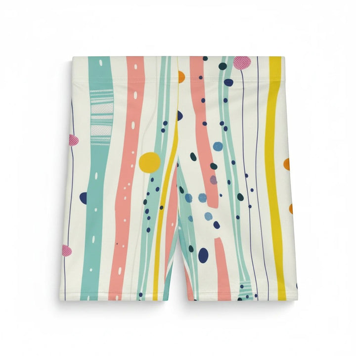 Sea Dragon Dreams pastel biker shorts with a playful mix of stripes, polka dots, and artistic brushstroke patterns.
