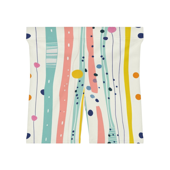 Sea Dragon Dreams high-waisted biker shorts in cream with pastel stripes, polka dots, and artistic brushstroke print.