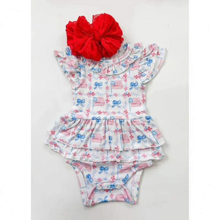 Sea Dragon Dreams American Girl bamboo onesie with flutter sleeves, tutu skirt, and patriotic flag print with red bow.