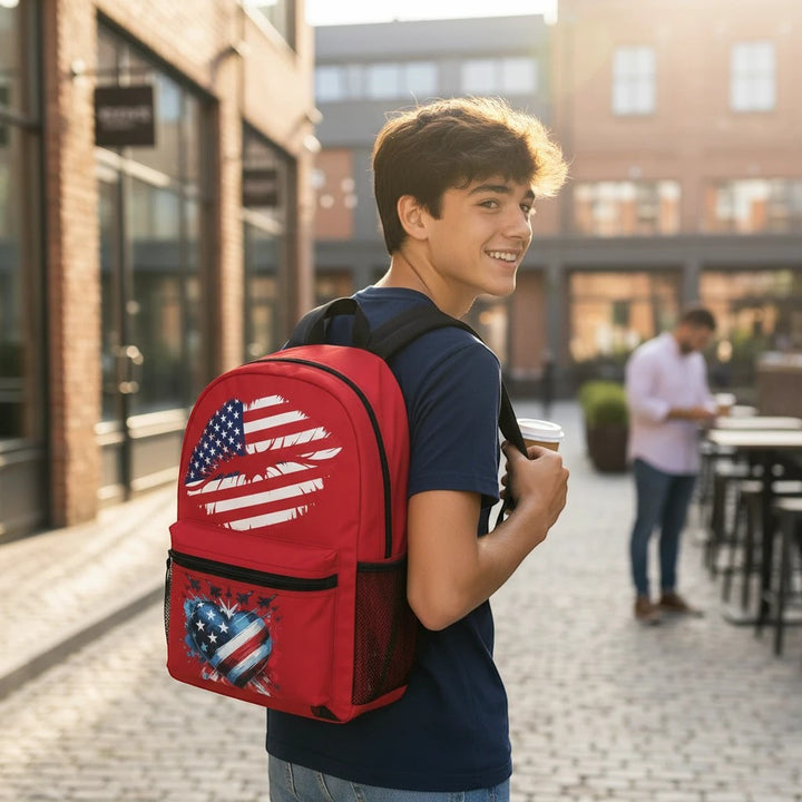 Sea Dragon Dreams patriotic backpack with American flag heart design worn by a young man on a city street