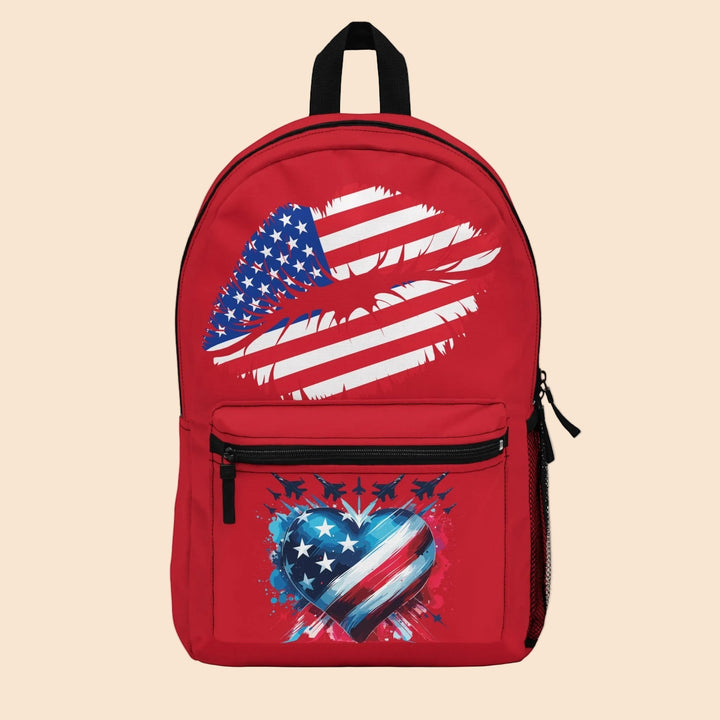Sea Dragon Dreams patriotic backpack in red with American flag heart and lip design, featuring durable polyester.