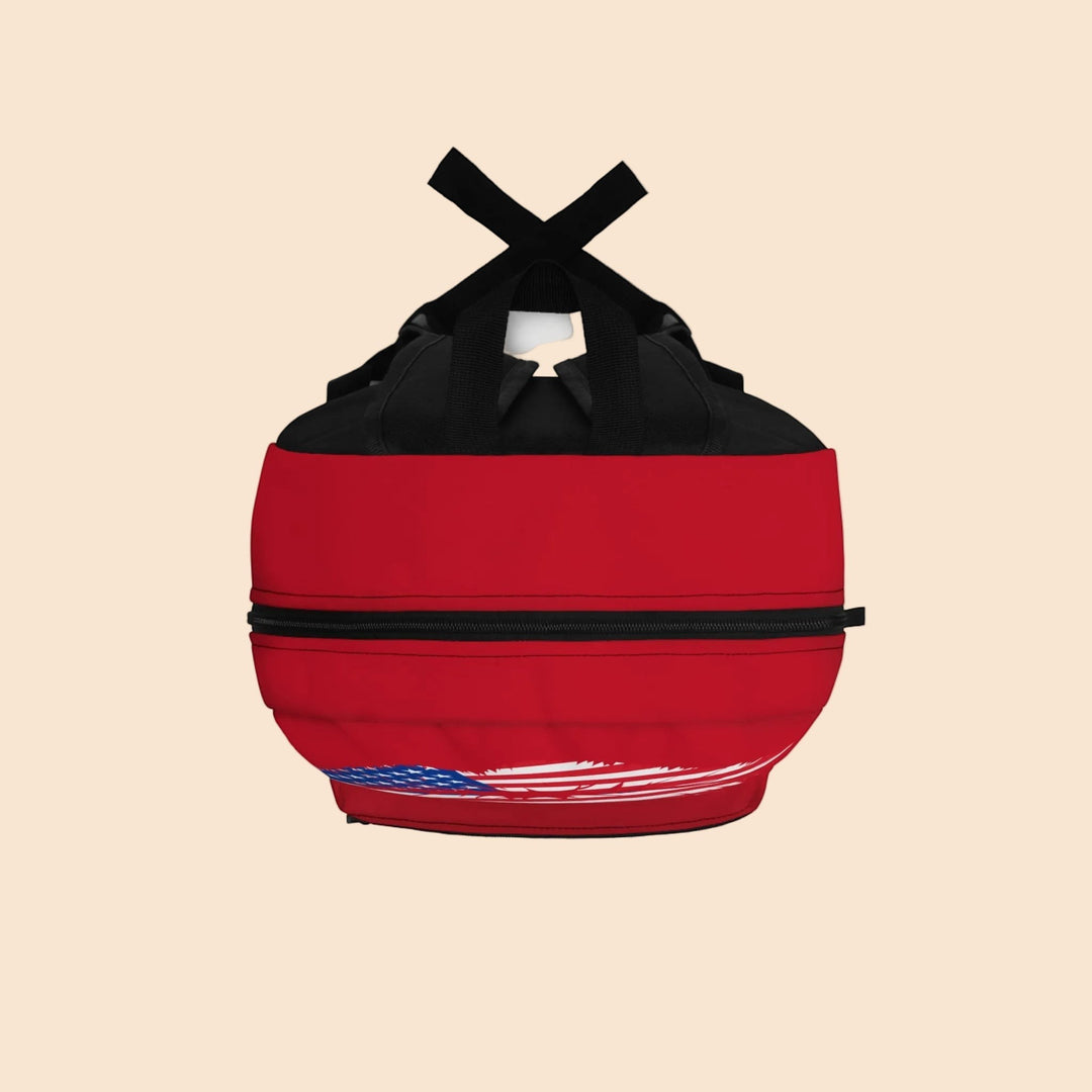 Sea Dragon Dreams patriotic backpack in red with American flag detail, featuring black straps and a top-down view.