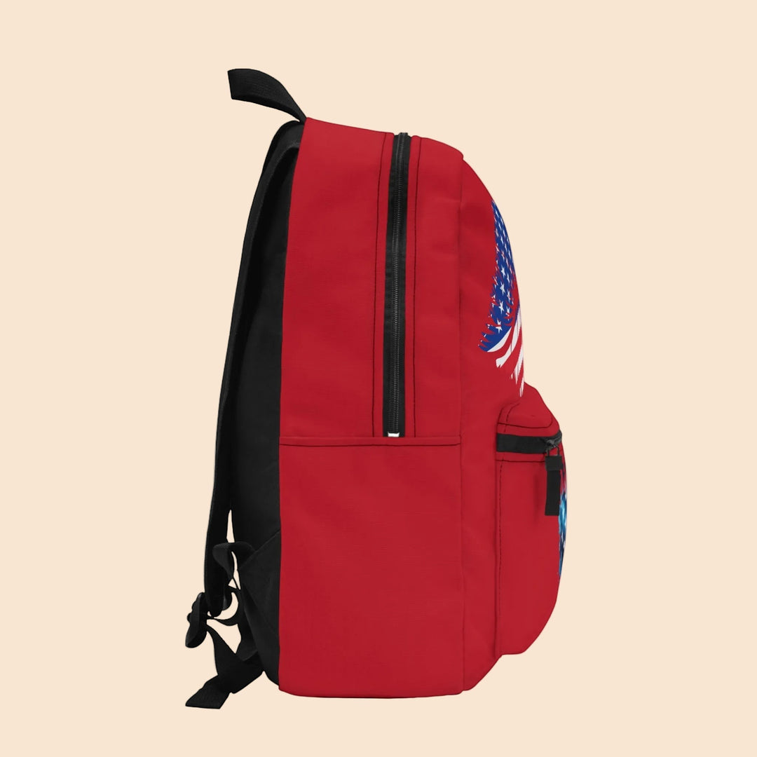 Sea Dragon Dreams red polyester backpack with a patriotic USA flag heart design, side view with black straps and zippers.