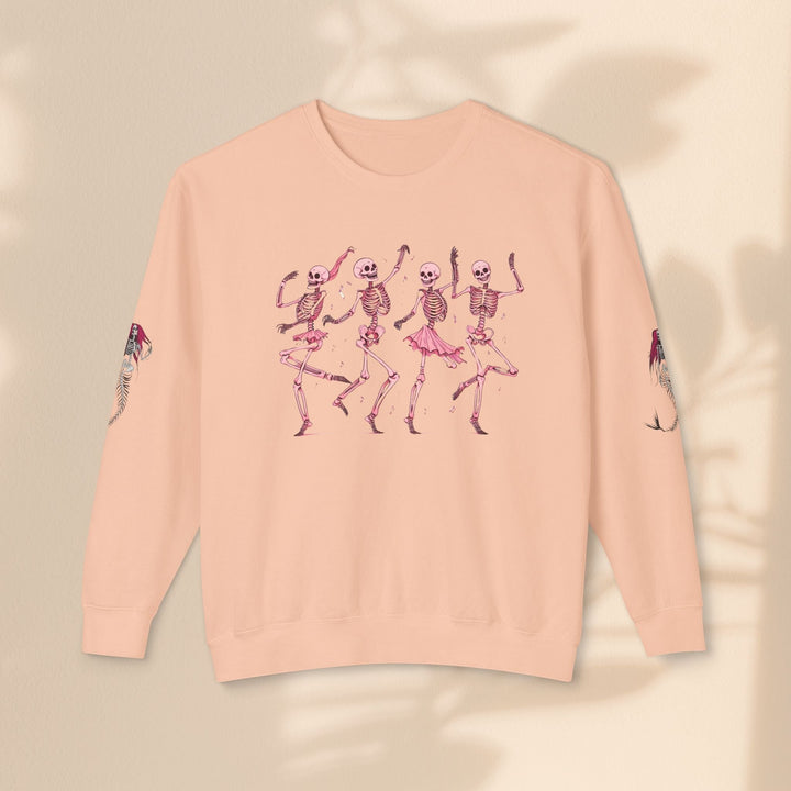 Sea Dragon Dreams peach crewneck sweatshirt featuring a dancing skeletons graphic and mermaid sleeve art.