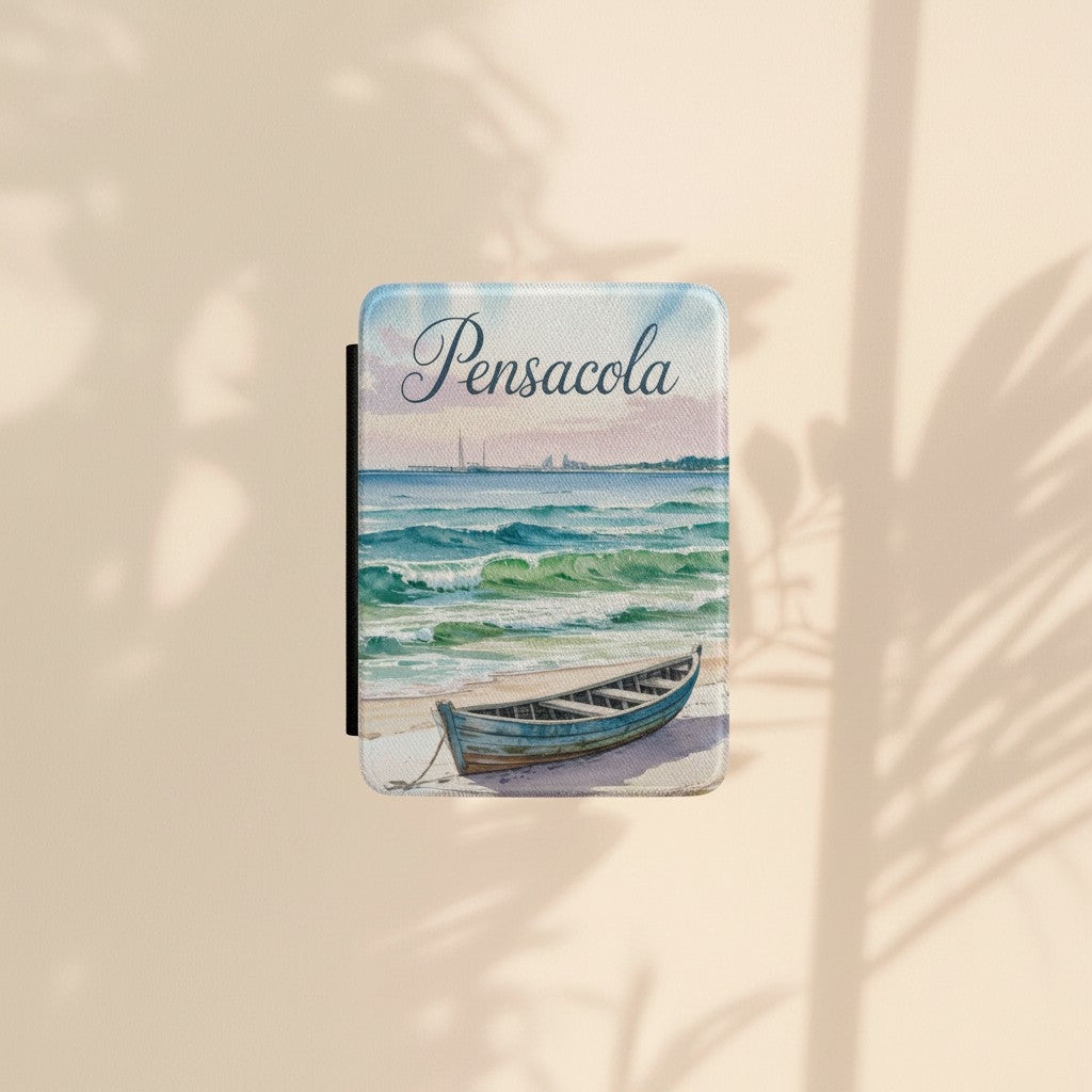 Sea Dragon Dreams Pensacola Beach Kindle Paperwhite case featuring a watercolor boat on a sandy shore with waves.