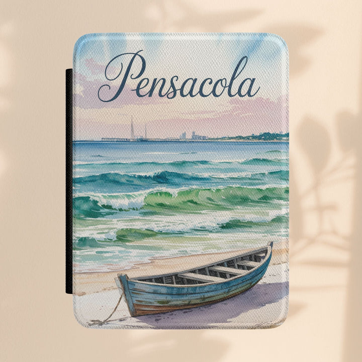 Sea Dragon Dreams Kindle Paperwhite case featuring a watercolor Pensacola beach scene with a boat on the sand