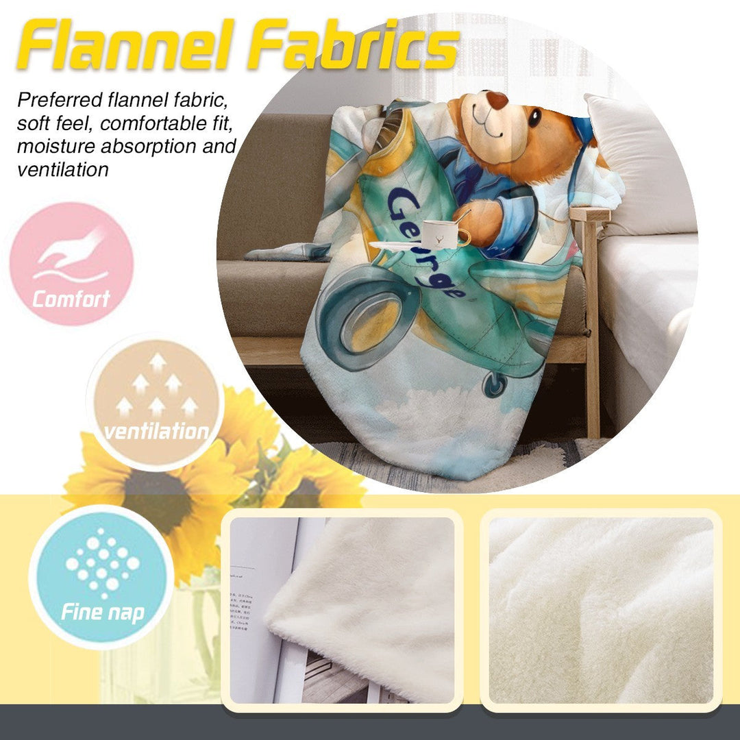 Sea Dragon Dreams personalised teddy bear pilot fleece blanket with custom name draped over a sofa