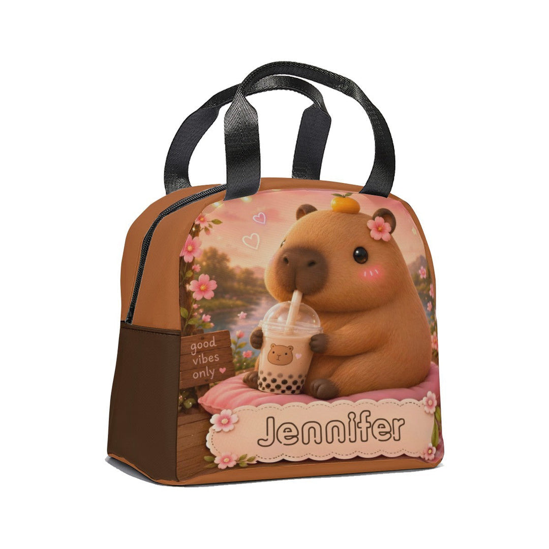 Sea Dragon Dreams personalized insulated lunch bag featuring a cute capybara drinking boba tea and custom name tag.