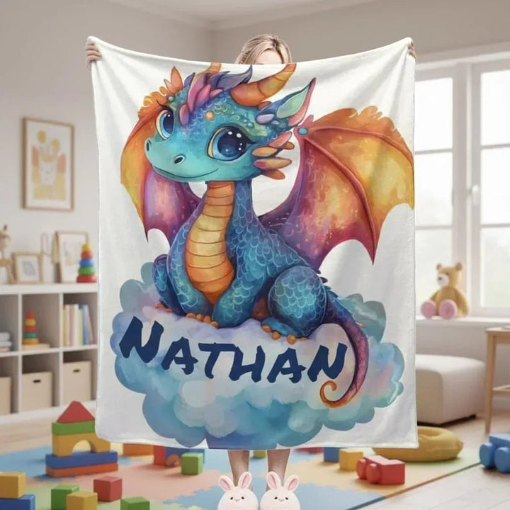 Sea Dragon Dreams personalized flannel fleece blanket featuring a blue dragon on a cloud with the name Nathan