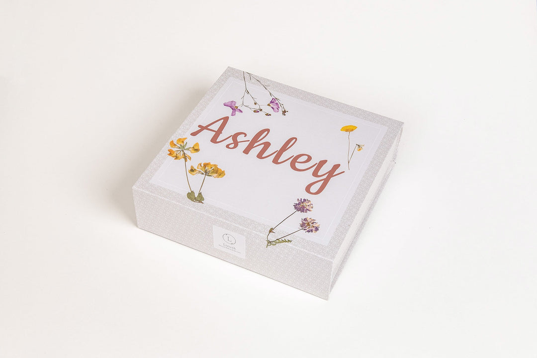 Sea Dragon Dreams personalized lavender spa gift box with floral design and the name Ashley printed on the lid.