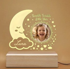 Sea Dragon Dreams personalized night light featuring a smiling moon, stars, and a child's photo on a wooden base.