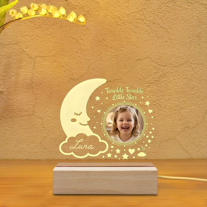 Sea Dragon Dreams personalized night light with a glowing moon, stars, and a child's photo on a wooden base.