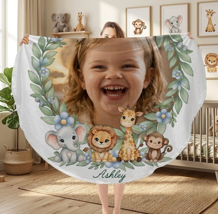 Sea Dragon Dreams personalized round baby blanket featuring a child's photo surrounded by safari animals and foliage.