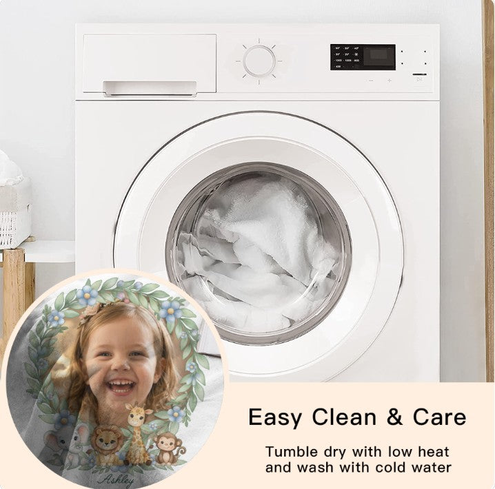Sea Dragon Dreams personalized round baby safari blanket with child photo, shown near a washing machine.