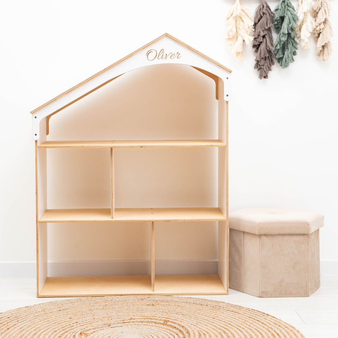 Sea Dragon Dreams personalized wooden dollhouse bookcase with name engraved on the roof in a bright nursery room.