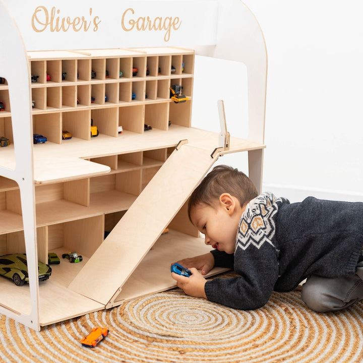 Sea Dragon Dreams personalized wooden toy car garage with multiple storage levels and a ramp for a young boy playing