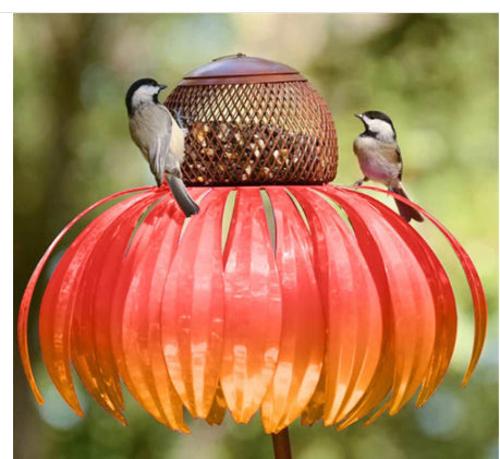 Sea Dragon Dreams petal-shaped metal bird feeder with red and orange flower design and birds feeding