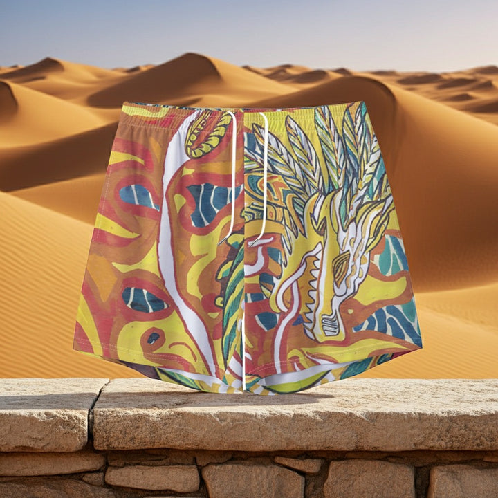 Sea Dragon Dreams men's polyester shorts featuring a vibrant phoenix and dragon fantasy print against a desert backdrop.