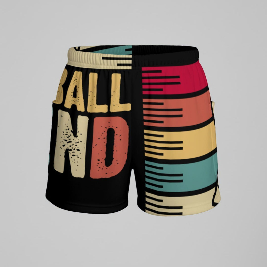 Sea Dragon Dreams athletic shorts with retro stripes and Pickleball Legend graphic in red, gold, and teal on black
