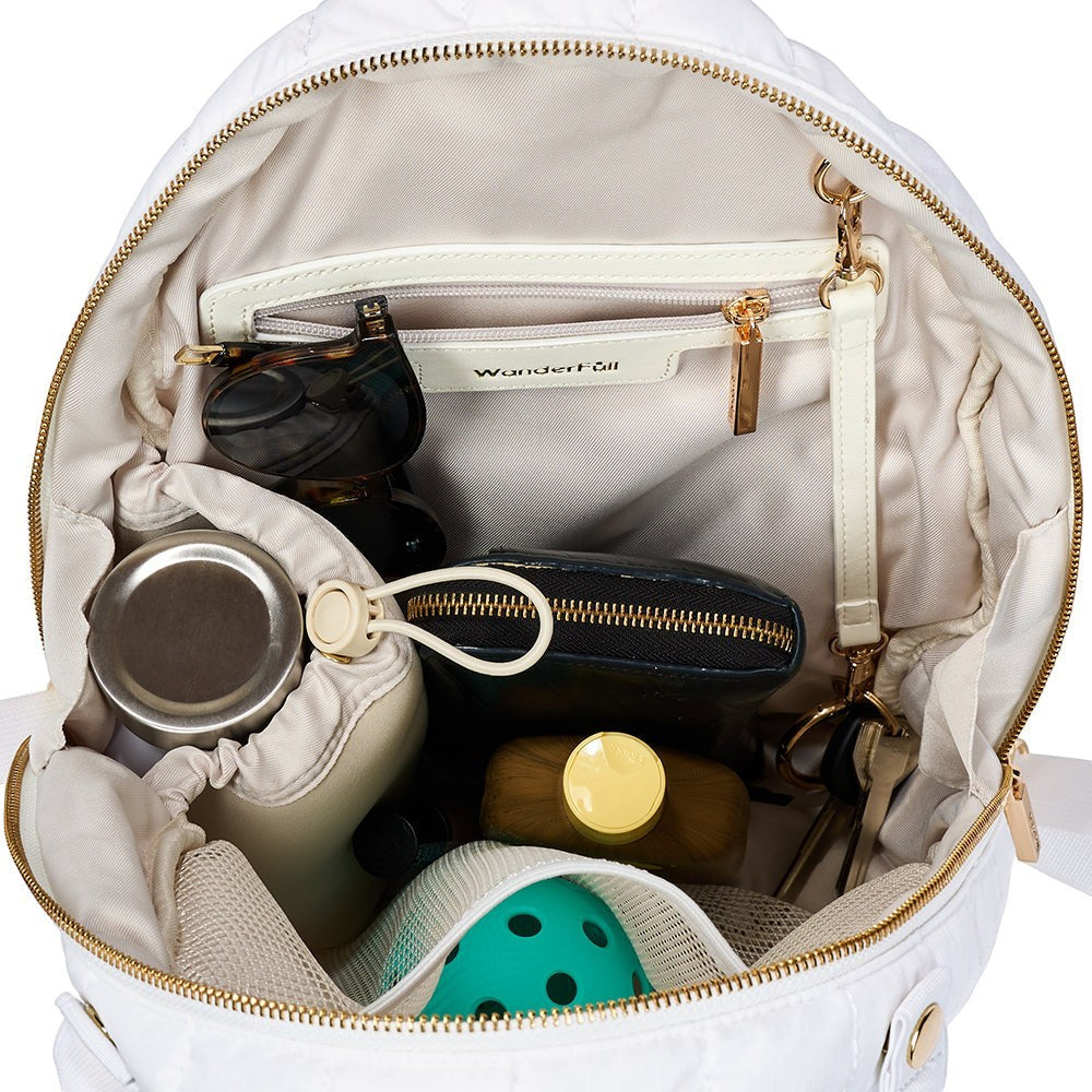 Interior view of Sea Dragon Dreams Pickleball HydroSling Bag showing organized water bottle, sunglasses, and gear.