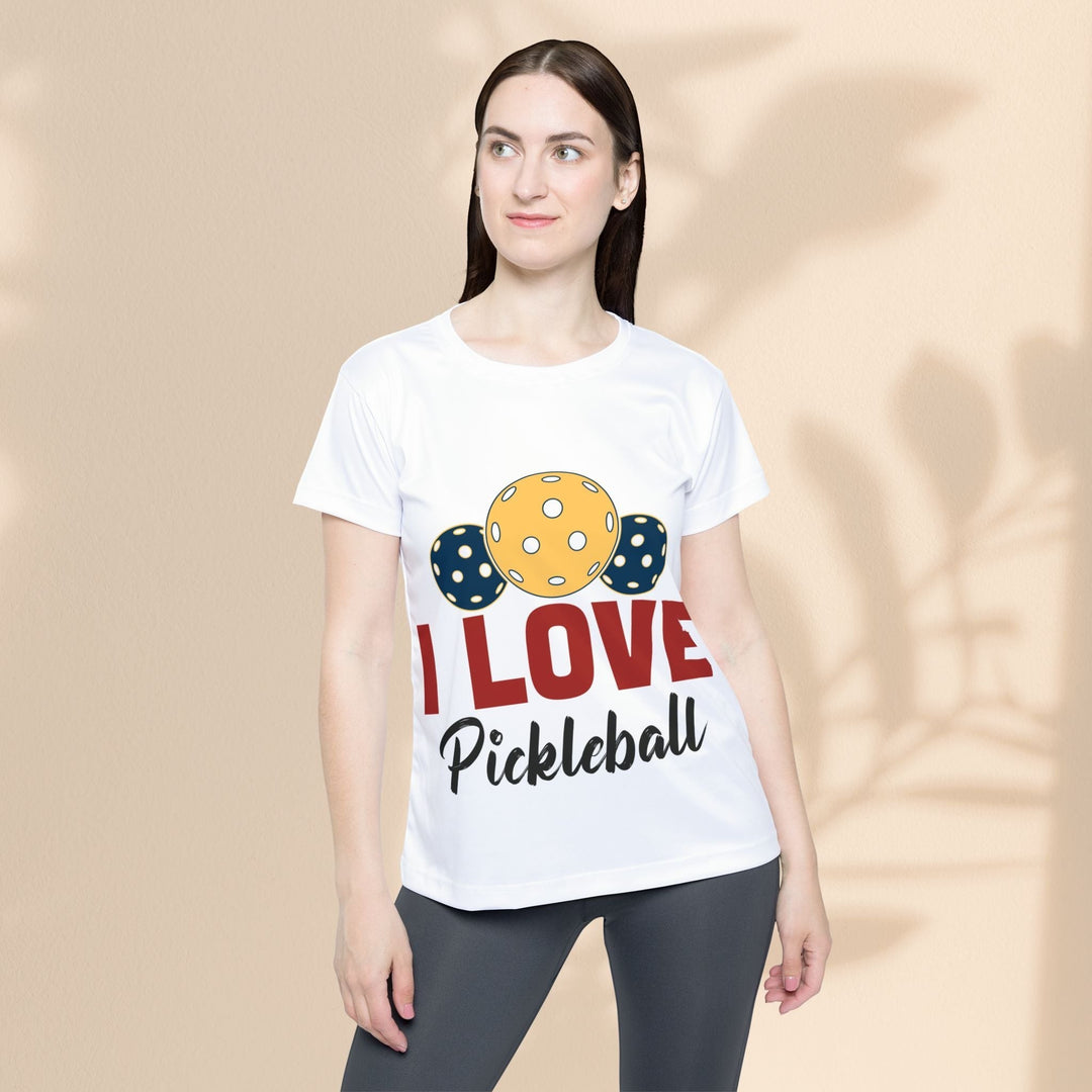 Sea Dragon Dreams white moisture-wicking polyester pickleball jersey with I Love Pickleball graphic on a female model