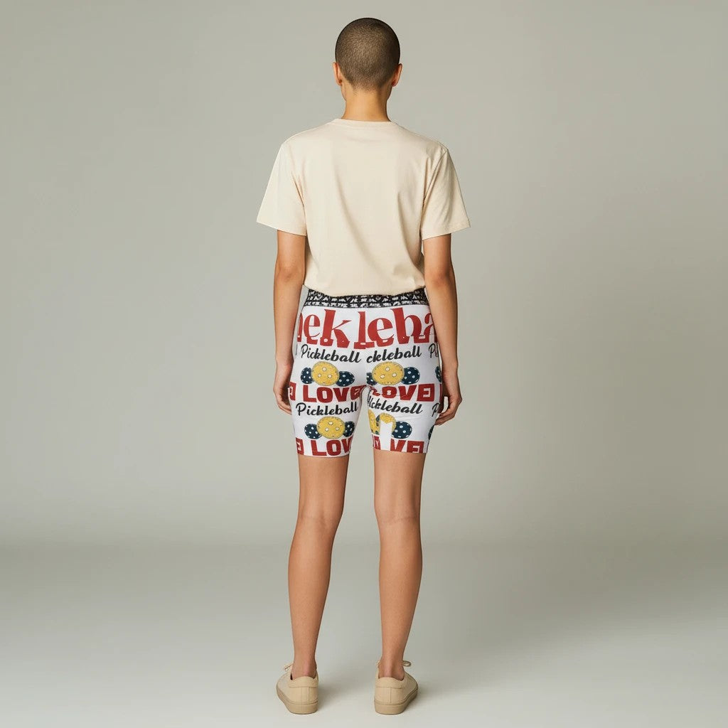 Sea Dragon Dreams women's workout shorts featuring a white pickleball print with red text and yellow balls