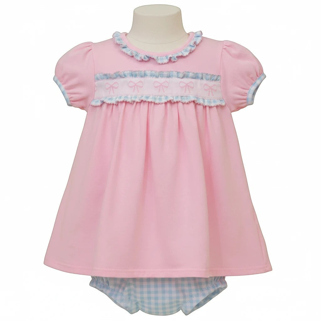 Sea Dragon Dreams pink baby dress with puff sleeves, ruffle trim, and bow-detail chest, paired with gingham bloomers.