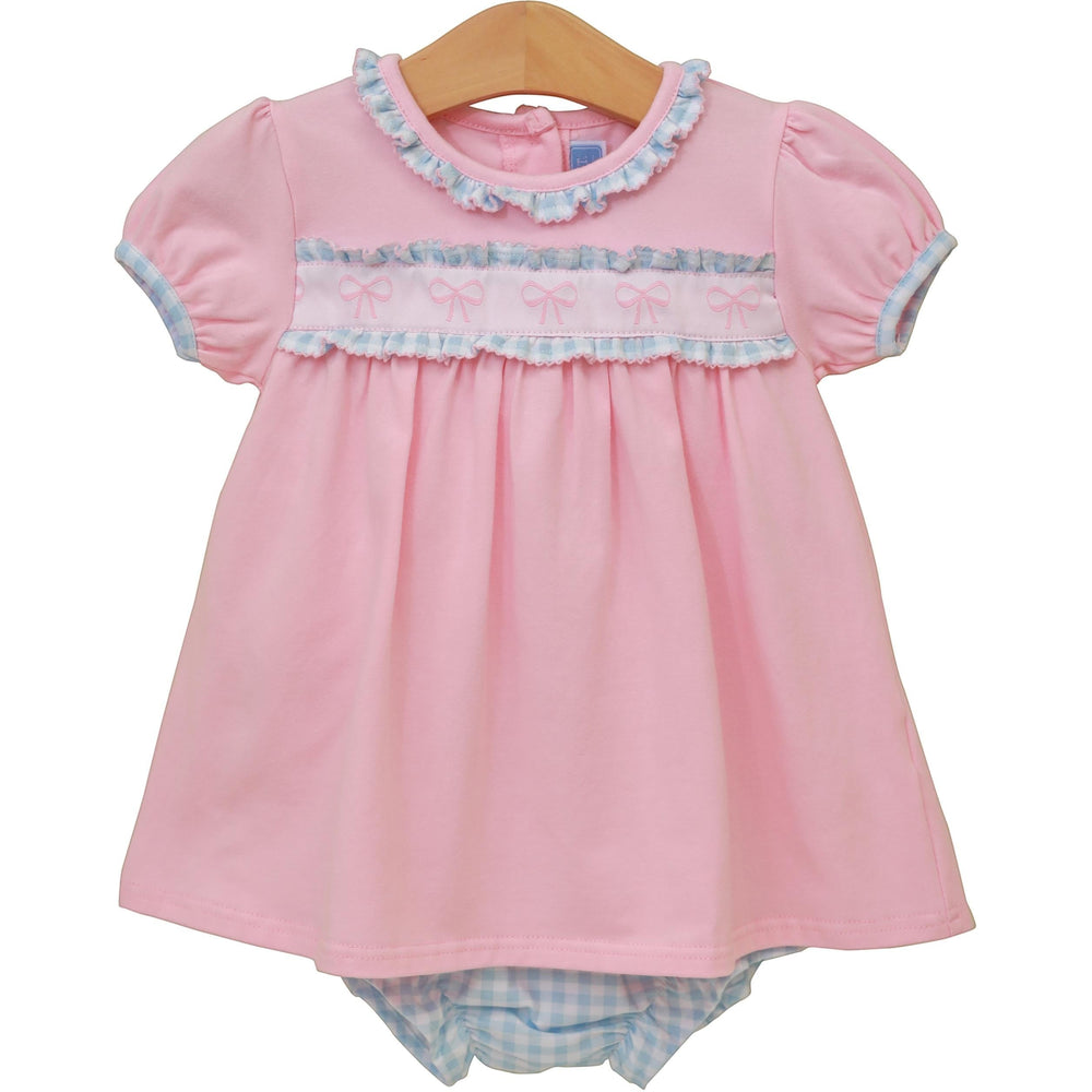 Sea Dragon Dreams pink baby dress with puff sleeves, ruffle trim, and bow-detail chest band with matching diaper cover.
