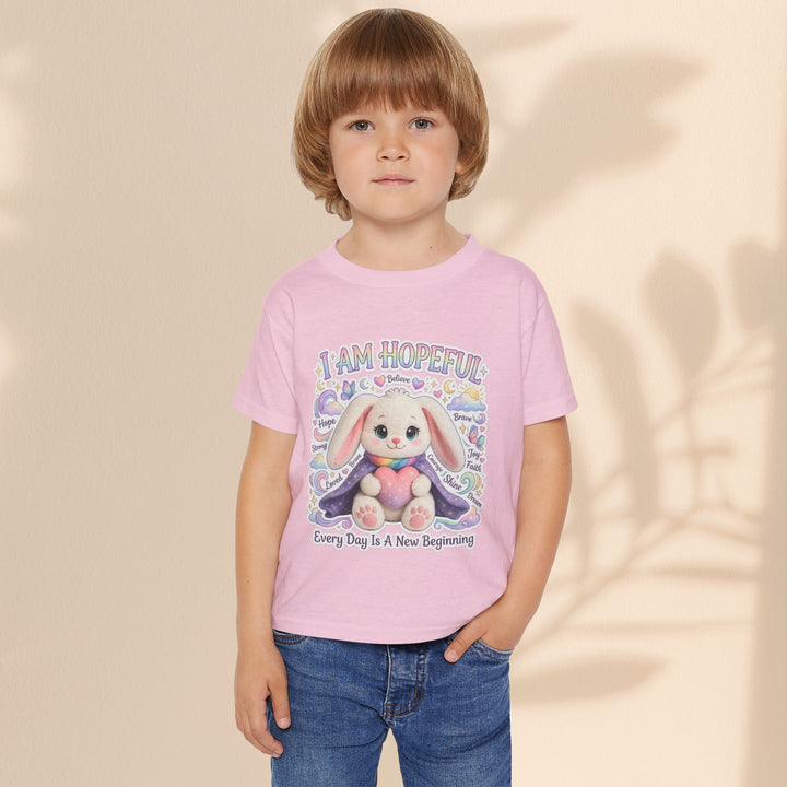 Sea Dragon Dreams toddler t-shirt in light pink cotton featuring a cute bunny graphic and I Am Hopeful text.