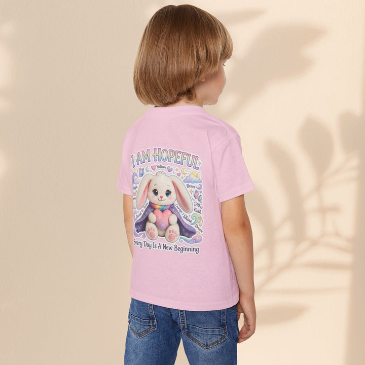 Sea Dragon Dreams toddler t-shirt in light pink cotton featuring a cute bunny graphic with I Am Hopeful text