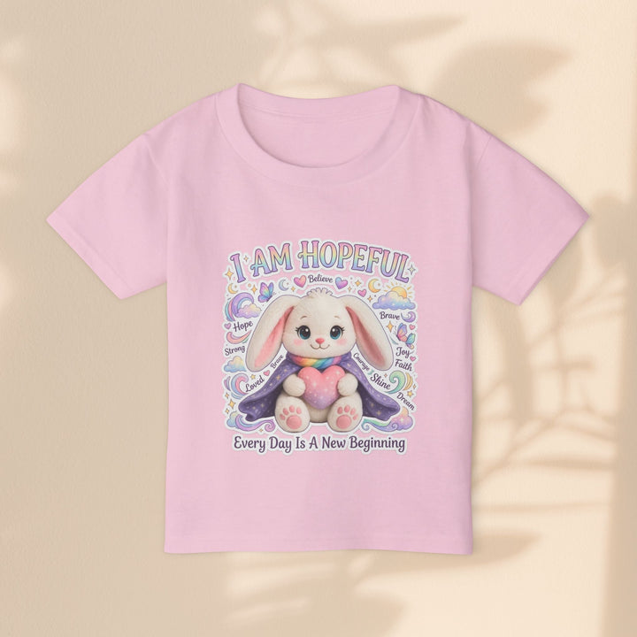 Sea Dragon Dreams pink cotton toddler t-shirt featuring a cute bunny graphic with the text I Am Hopeful