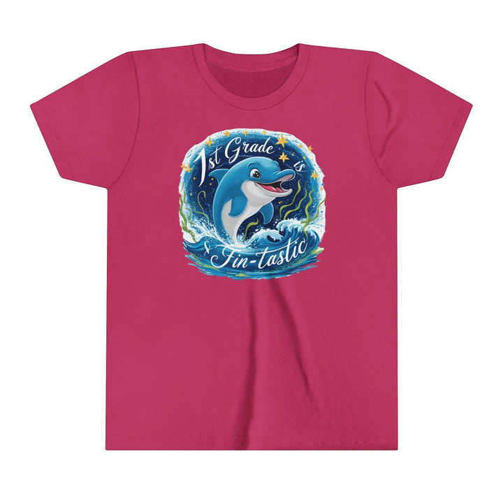 Sea Dragon Dreams youth short sleeve tee in dark pink featuring a 1st Grade Fintastic dolphin graphic print.