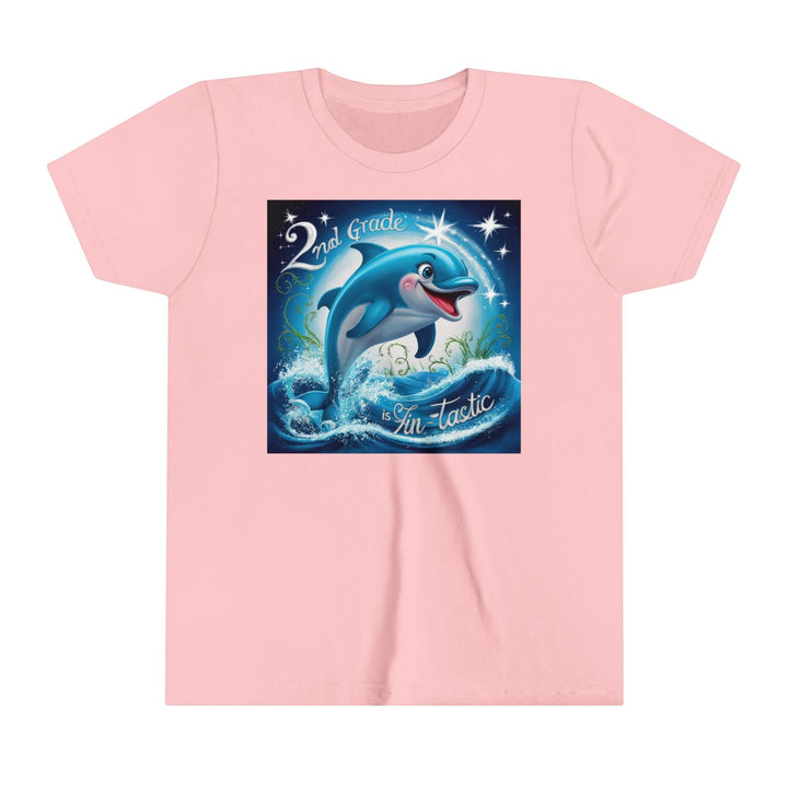 Sea Dragon Dreams light pink youth t-shirt featuring a playful dolphin jumping out of ocean waves with 2nd Grade FinTastic text.