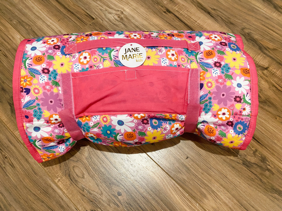 Sea Dragon Dreams Jane Marie pink floral kids roll-up nap mat with carrying handle and hook-and-loop closure straps.