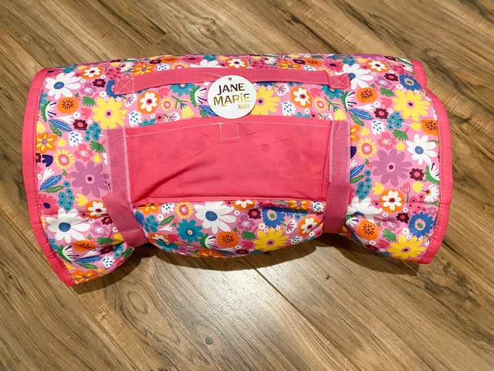 Sea Dragon Dreams Jane Marie pink floral kids roll-up nap mat with carrying handle and hook-and-loop closure straps.