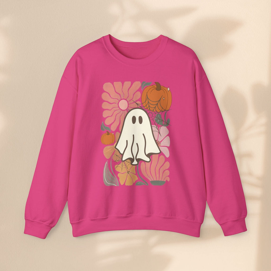 Sea Dragon Dreams pink crewneck sweatshirt featuring a retro ghost, pumpkin, and floral graphic print.