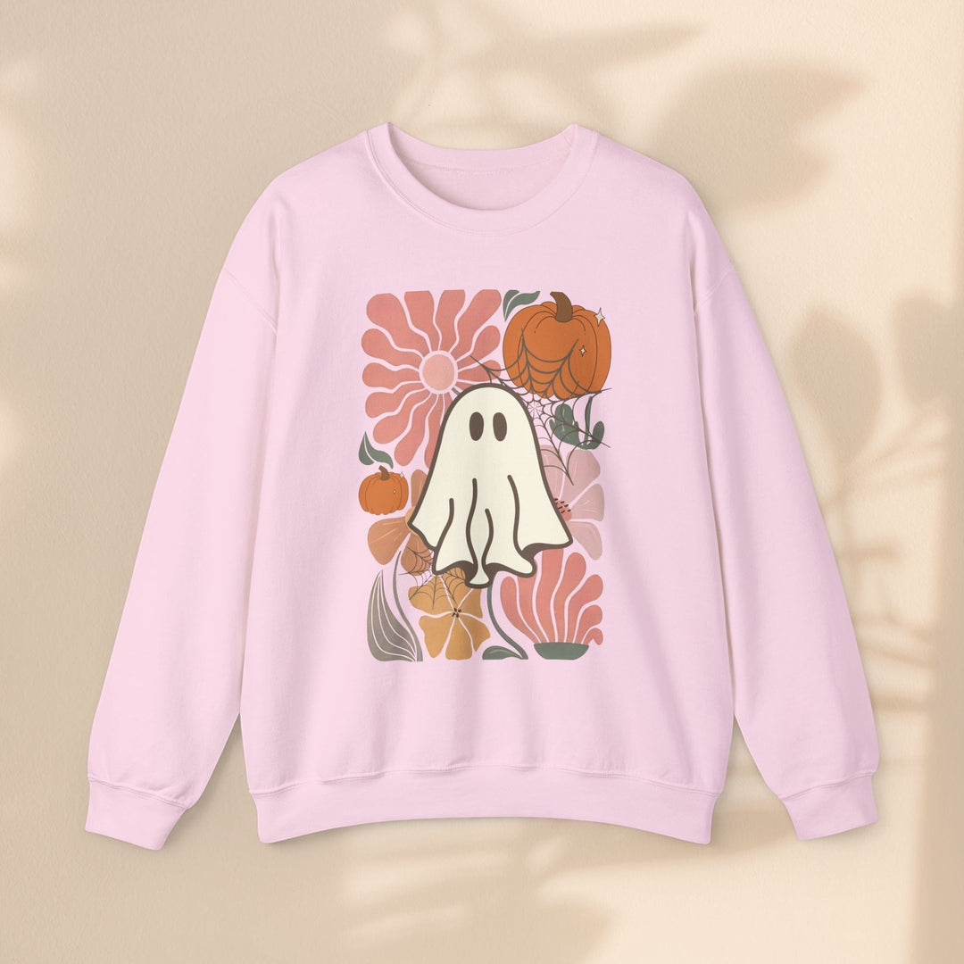 Sea Dragon Dreams light pink crewneck sweatshirt featuring a retro ghost and pumpkin floral graphic print.