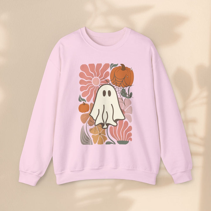 Sea Dragon Dreams light pink crewneck sweatshirt featuring a retro ghost and pumpkin floral graphic print.