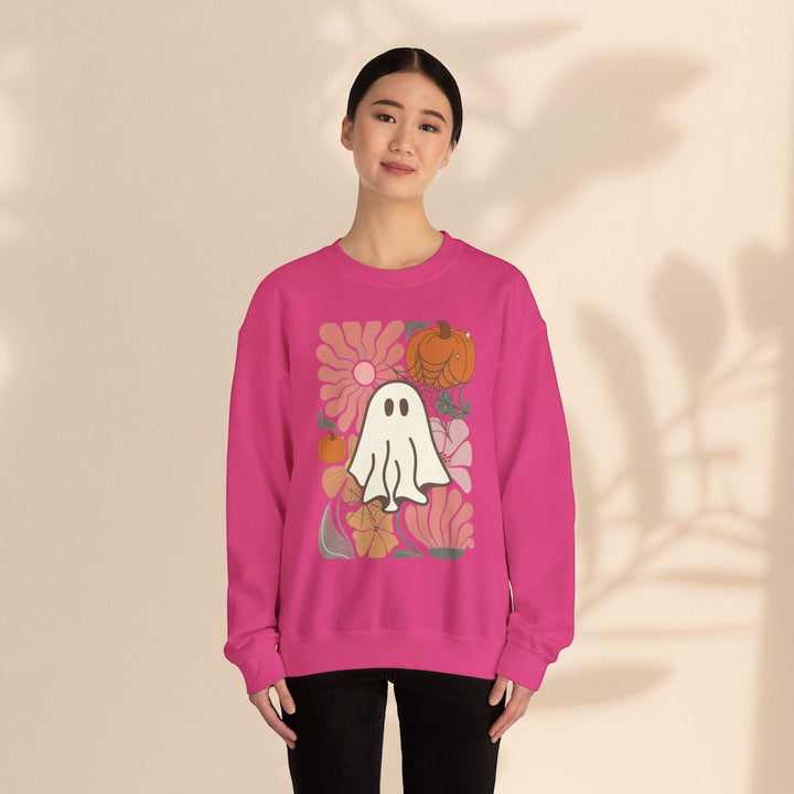 Sea Dragon Dreams unisex pink crewneck sweatshirt featuring a retro ghost and pumpkin floral graphic print.