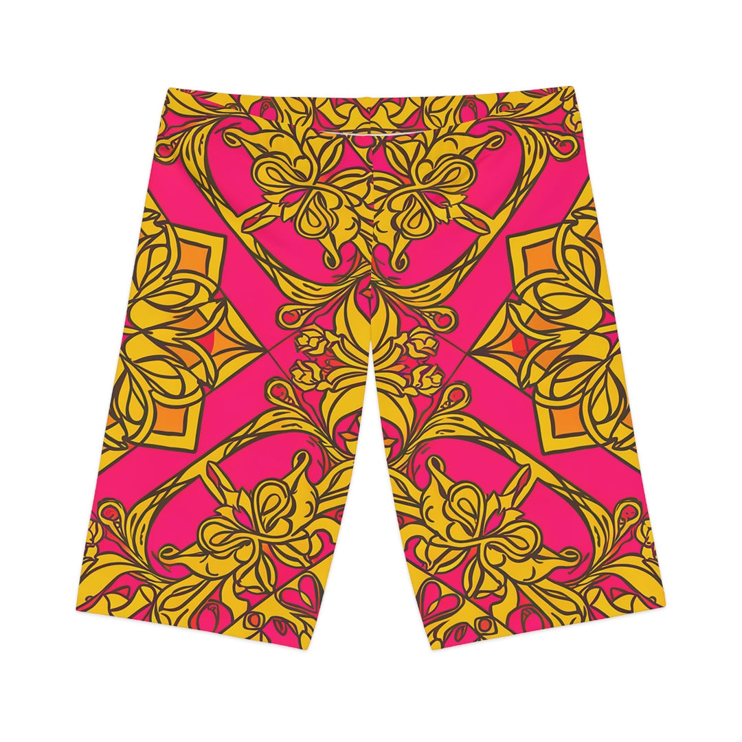 Sea Dragon Dreams Symmetry bike shorts featuring a vibrant pink and gold floral-inspired symmetrical pattern.