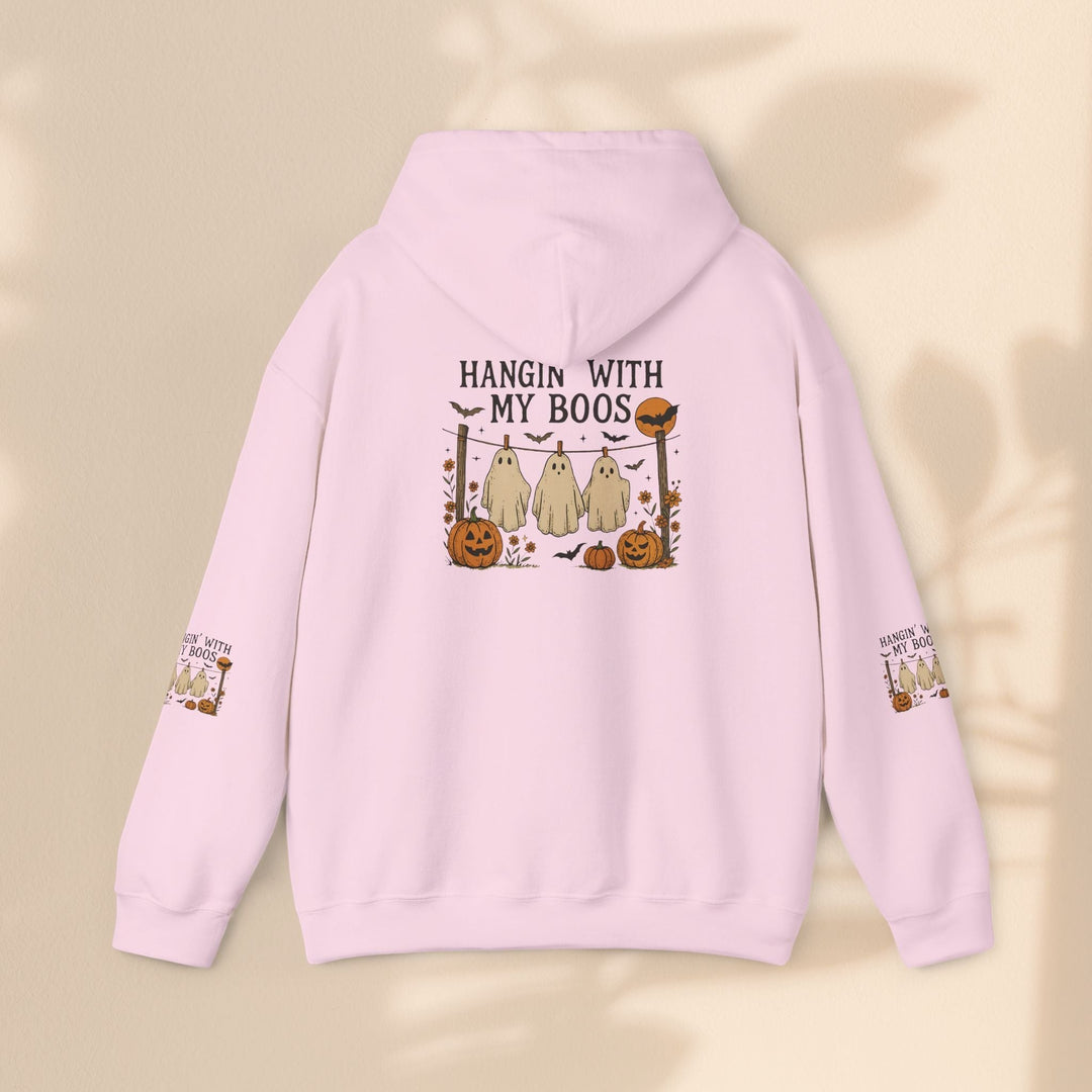 Sea Dragon Dreams light pink Halloween hoodie featuring a Hanging With My Boos ghost and pumpkin graphic on the back.