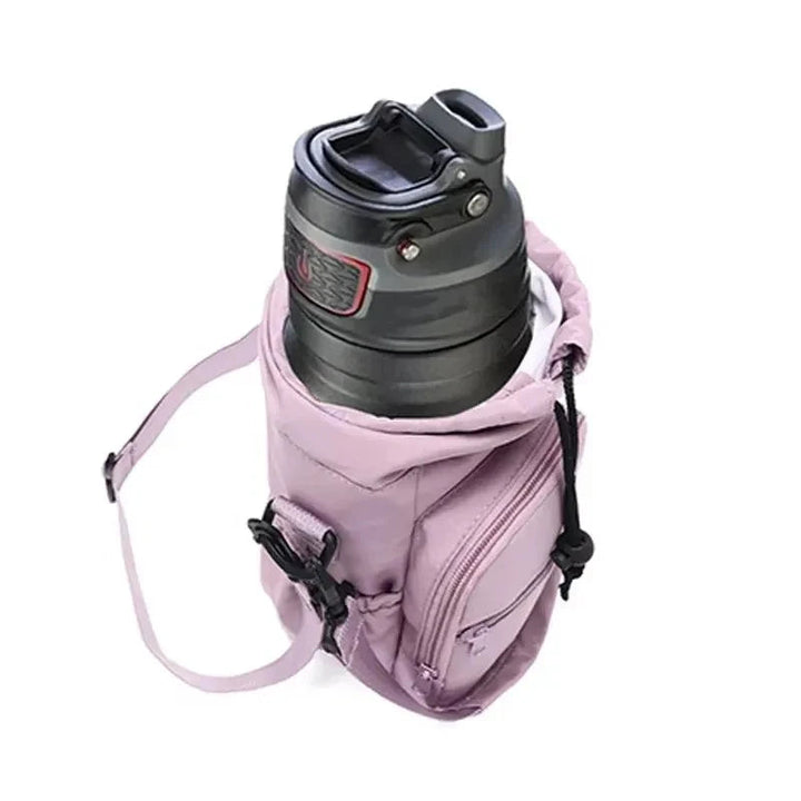 Sea Dragon Dreams insulated pink water bottle carrier bag with adjustable shoulder strap and external phone pocket