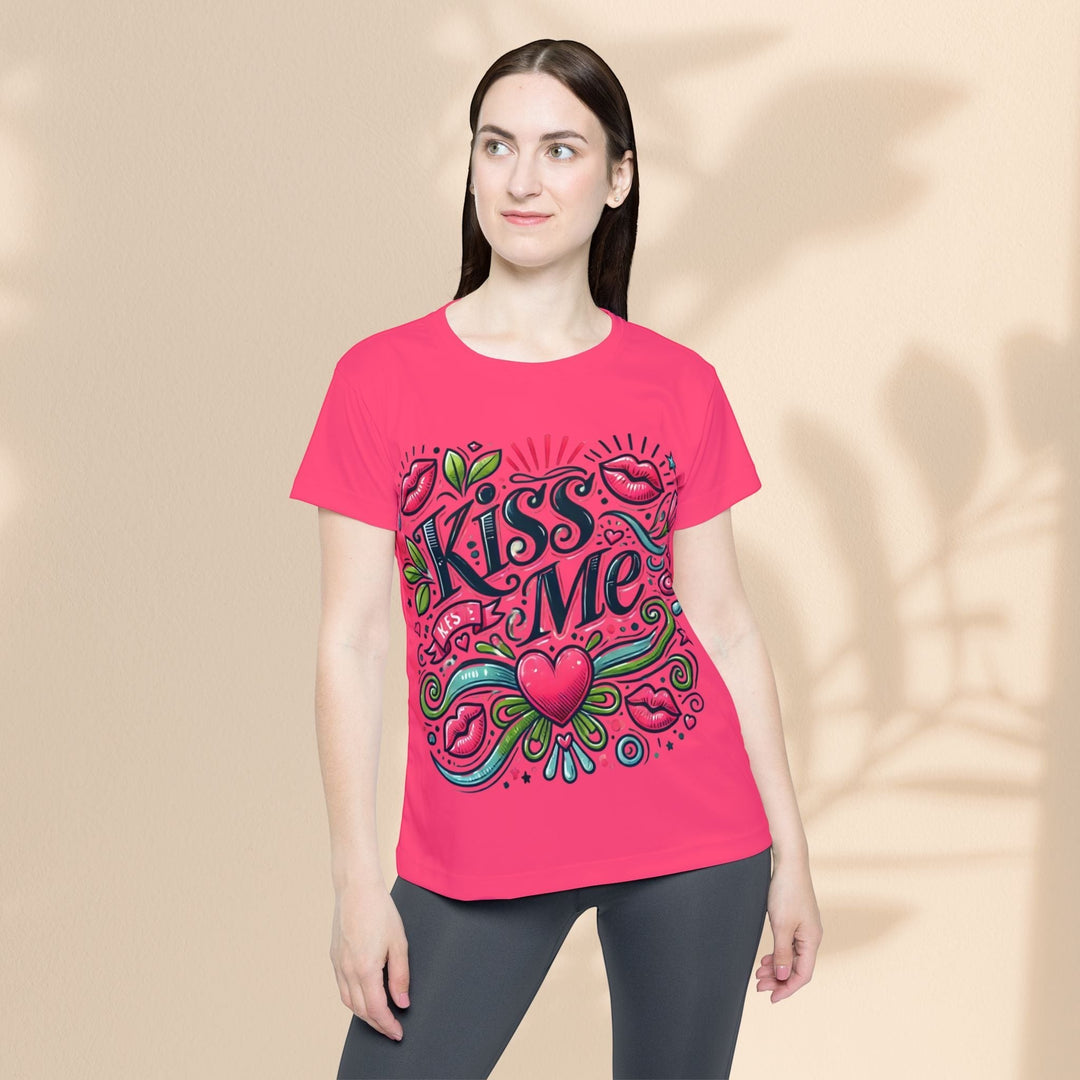 Sea Dragon Dreams women's pink sports jersey featuring a playful Kiss Me graphic with hearts and lips design.
