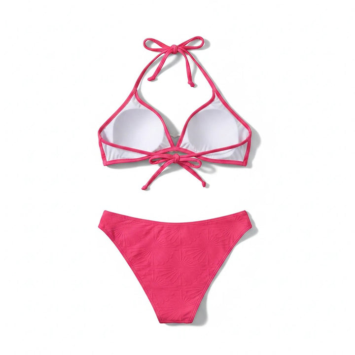 Sea Dragon Dreams pink lace-up bikini set with textured fabric and adjustable straps on a white background
