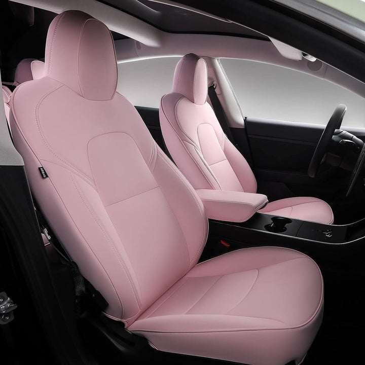 Sea Dragon Dreams pink leather seat covers installed in a Tesla Model 3 or Model Y interior for a custom look.