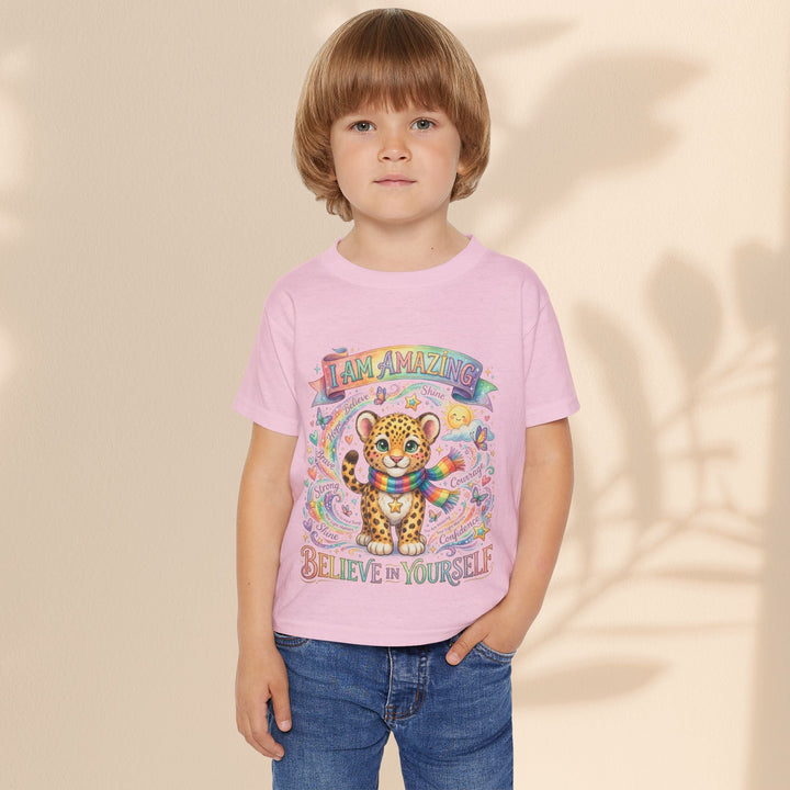 Sea Dragon Dreams toddler t-shirt in light pink cotton featuring a cute leopard with a rainbow scarf and affirmations.