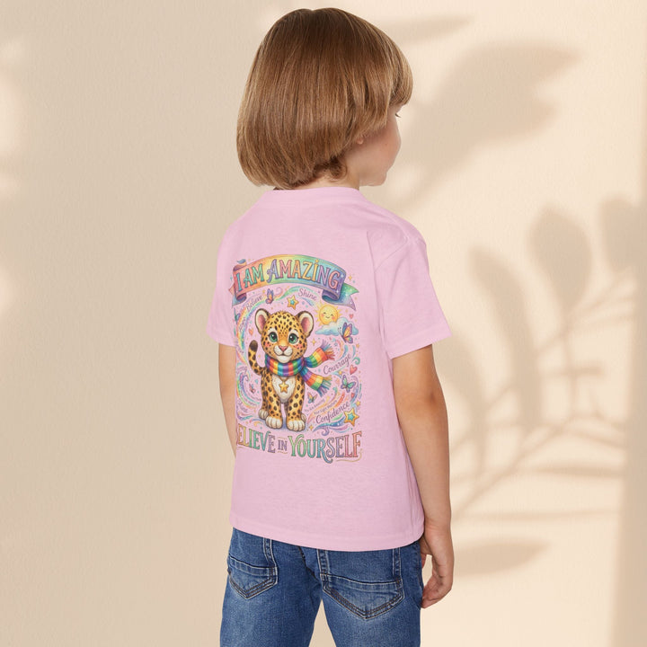 Sea Dragon Dreams toddler t-shirt in light pink cotton featuring a cute leopard, rainbow, and empowering text.